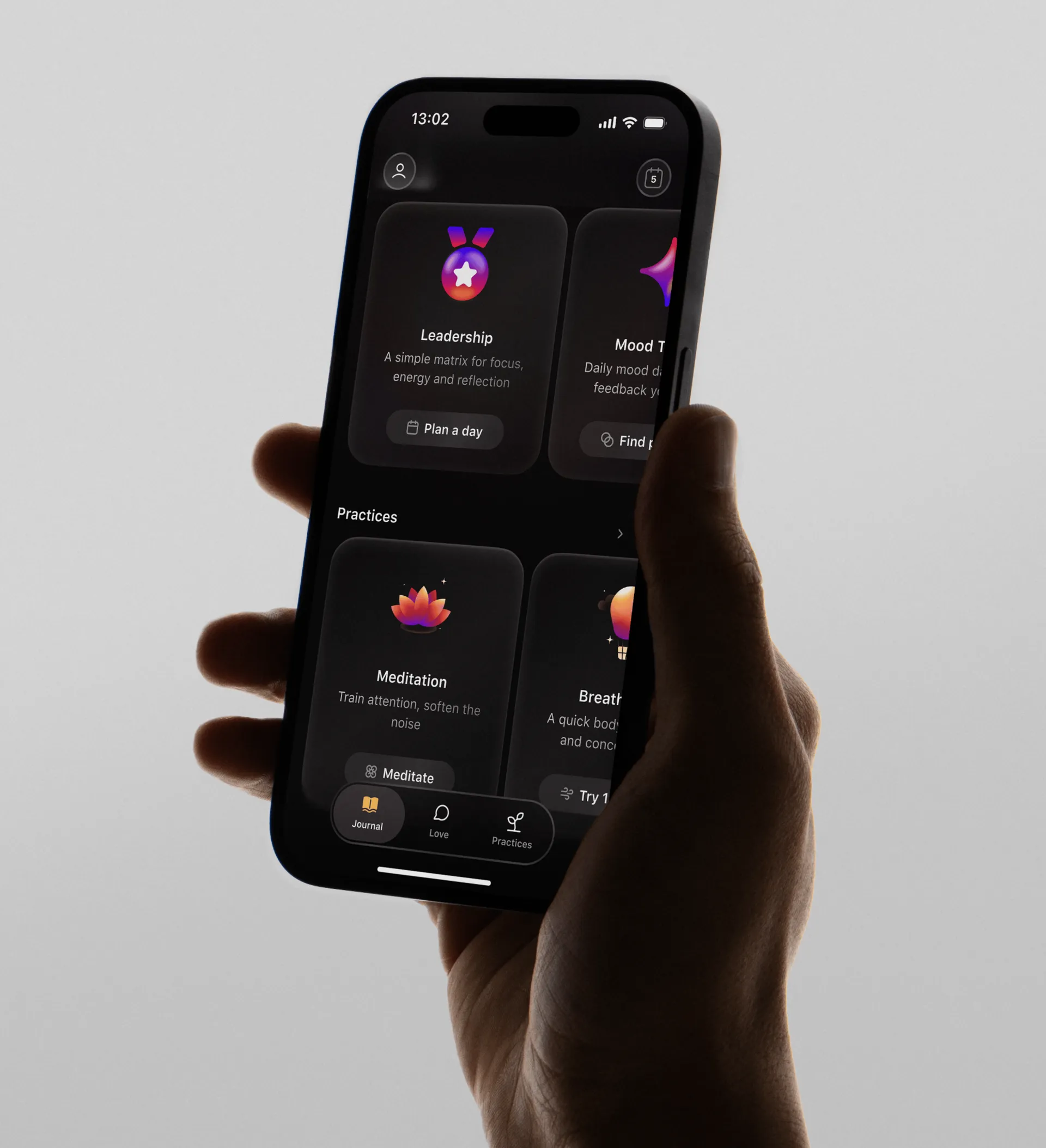 Goodly home screen with reflection and meditation cards, held in hand